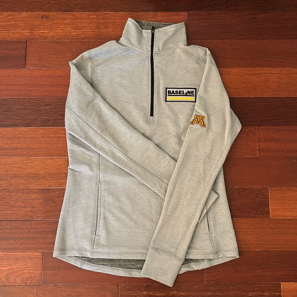 “J America” Minnesota Quarterzip. Color: Grey with logo. Size: M.